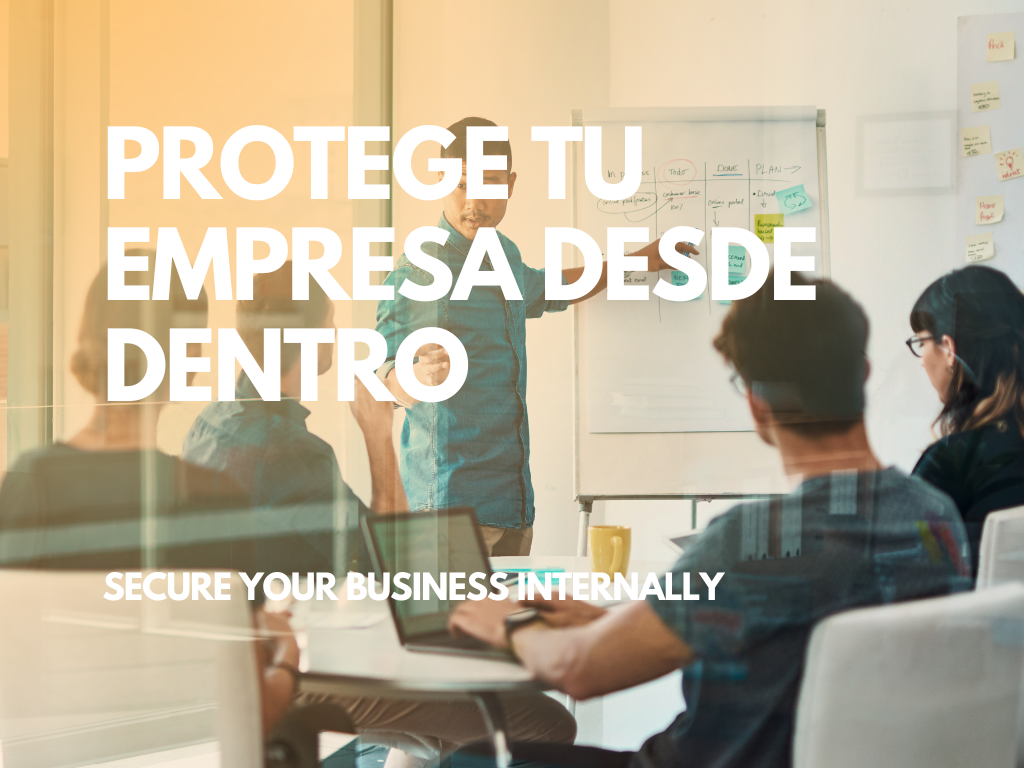 Socios revisando un contrato en una sala de reuniones, con actitud colaborativa.